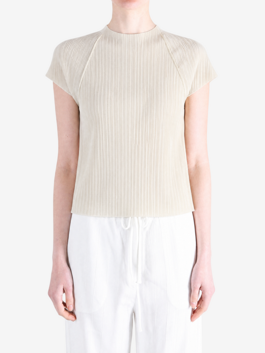 Grey tops worn by a person, showing the tops fit