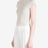 Grey tops worn by a person, showing the tops fit