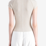 Grey tops worn by a person, showing the tops fit