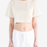 White top worn by a person, showing the top fit