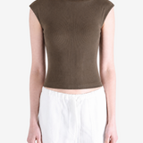 Brown top worn by a person, showing the top's fit