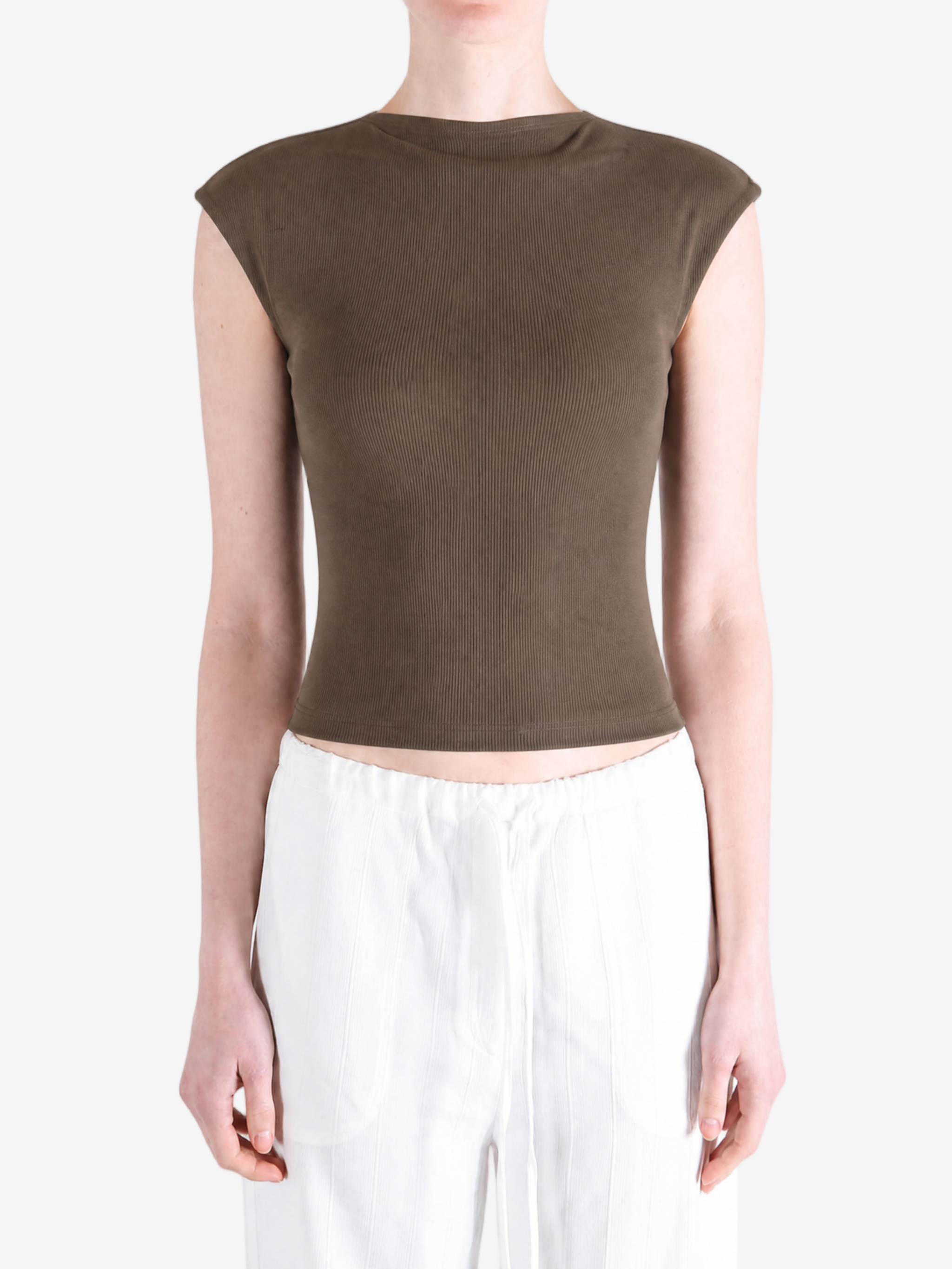 Brown top worn by a person, showing the top's fit