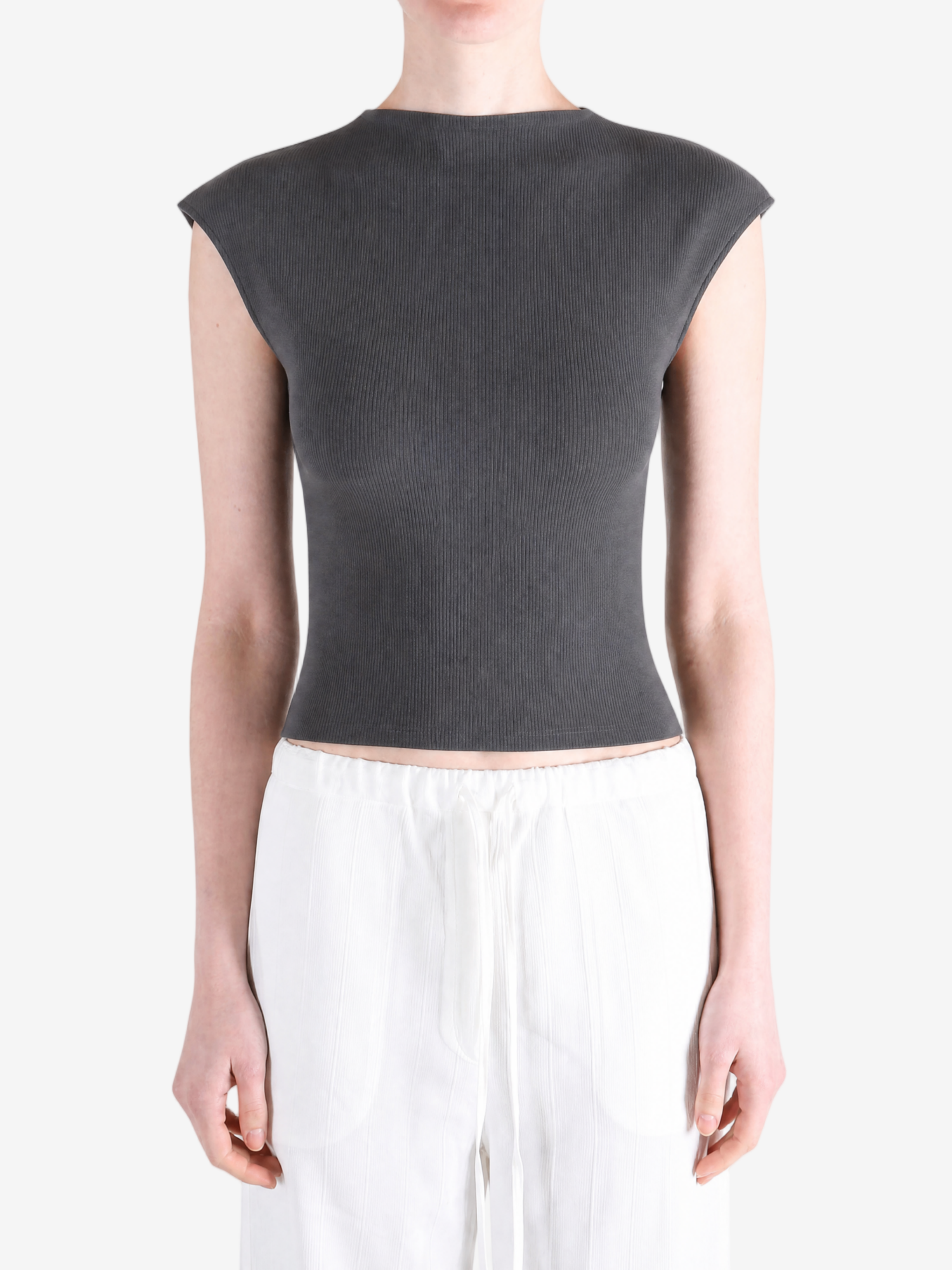 Black top worn by a person, showing the top's fit