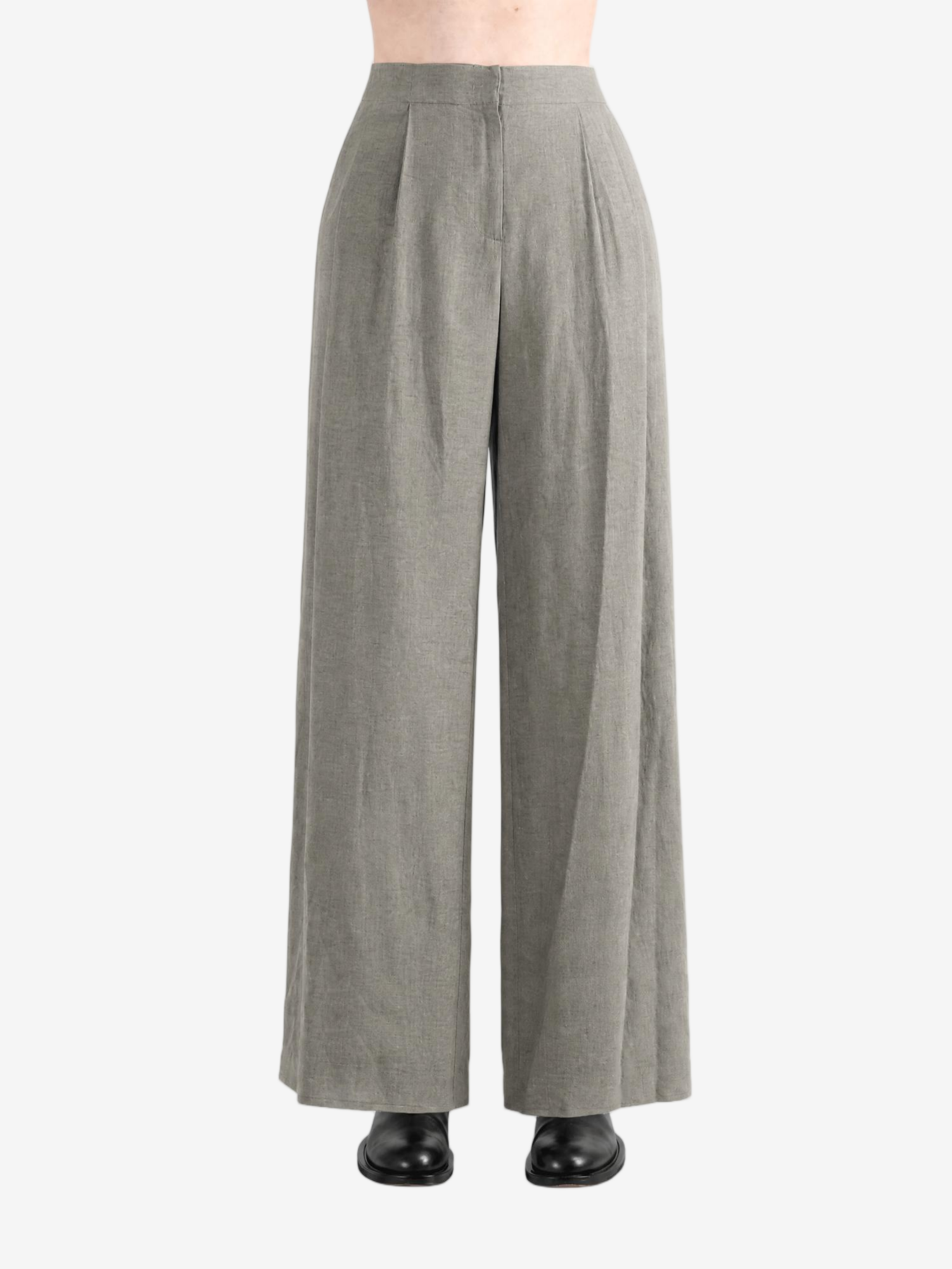 Grey pants worn by a person, showing the pants's fit