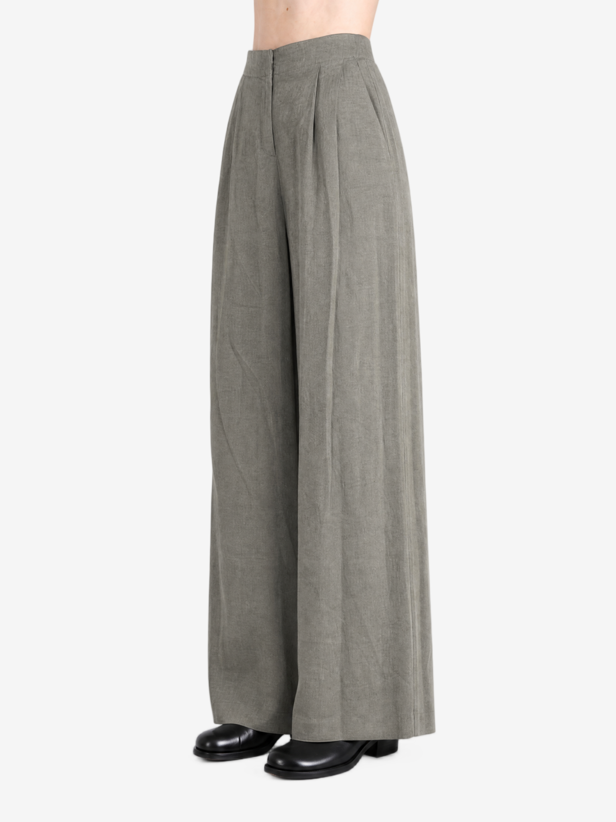 Grey pants worn by a person, showing the pants's fit