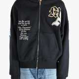 Black jackets worn by a person, showing the jackets fit