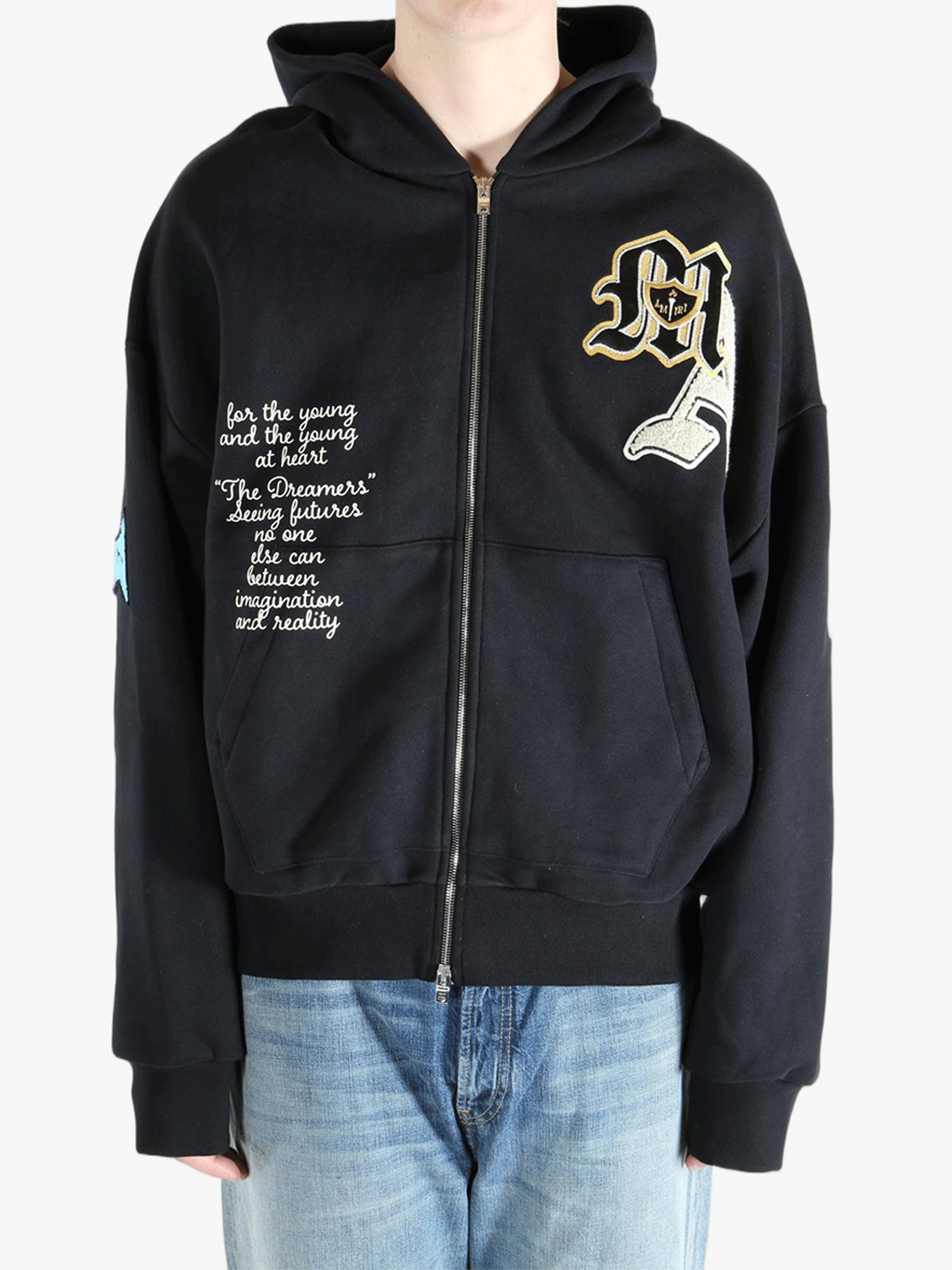 Black jackets worn by a person, showing the jackets fit