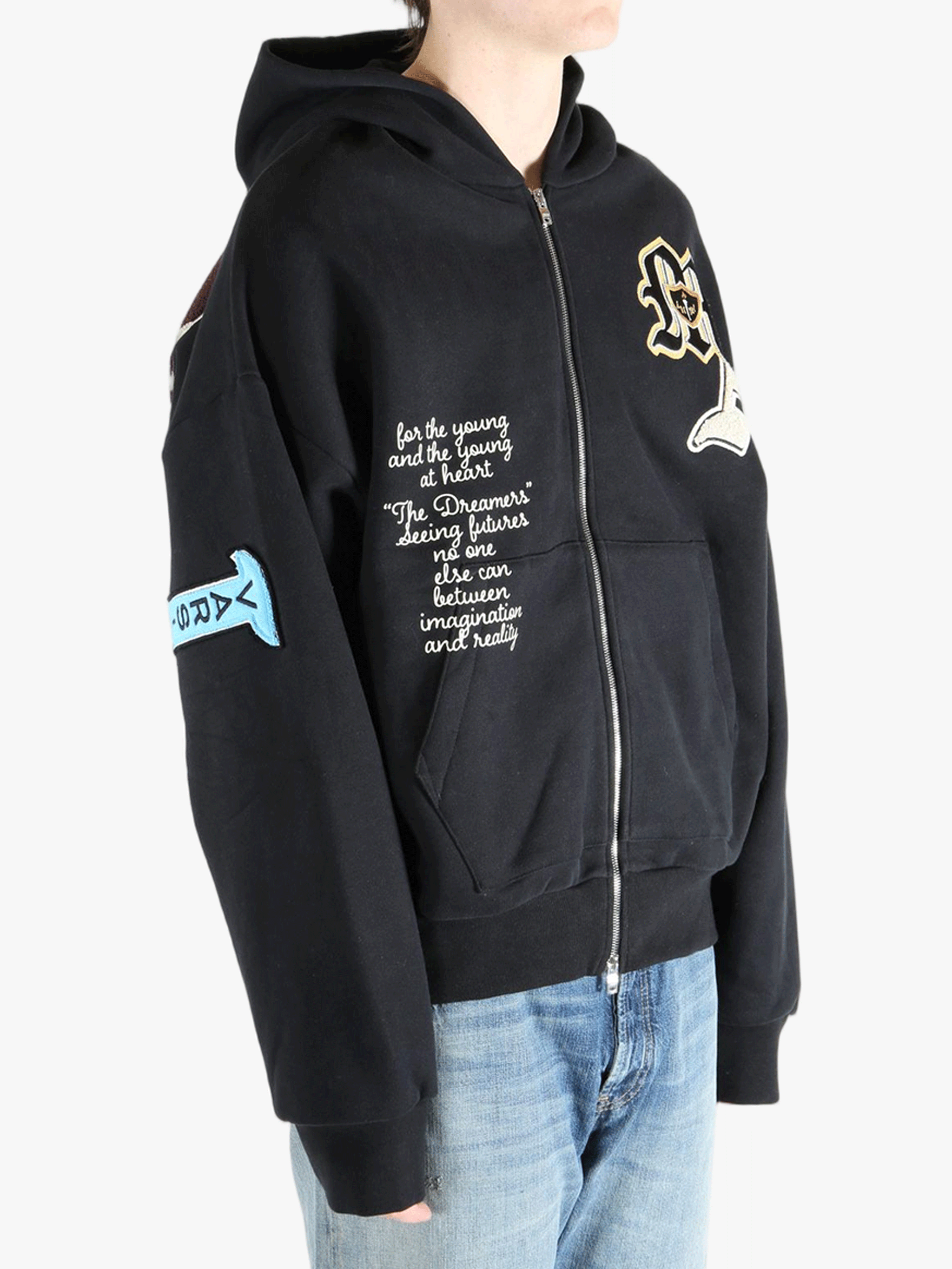 Black jackets worn by a person, showing the jackets fit