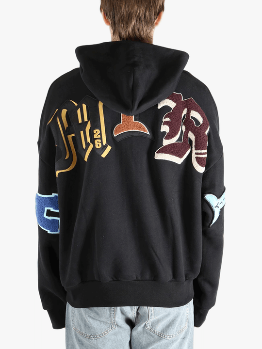 Black jackets worn by a person, showing the jackets fit