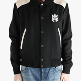 Black hoodies worn by a person, showing the hoodies fit