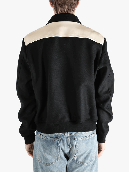 Black hoodies worn by a person, showing the hoodies fit