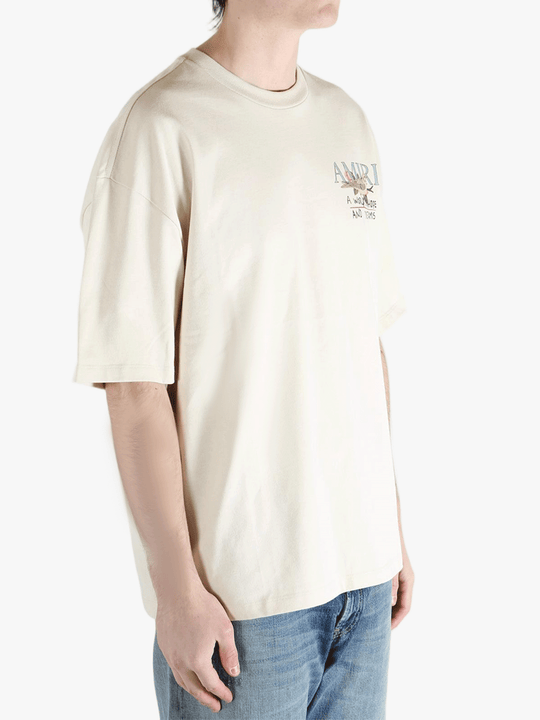 White t-shirts worn by a person, showing the shirt's fit