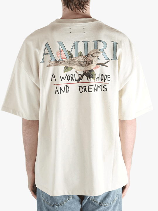 White t-shirts worn by a person, showing the shirt's fit