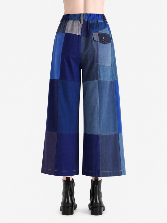 Blue pant worn by a person, showing the pant fit