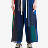 Blue pants worn by a person, showing the pants' fit.