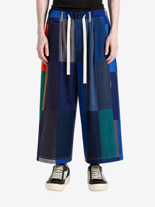 Blue pants worn by a person, showing the pants' fit.