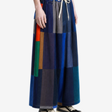Blue pants worn by a person, showing the pants' fit.