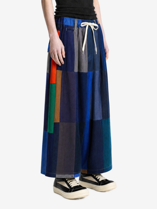 Blue pants worn by a person, showing the pants' fit.