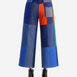 Blue pants worn by a person, showing the pants' fit.