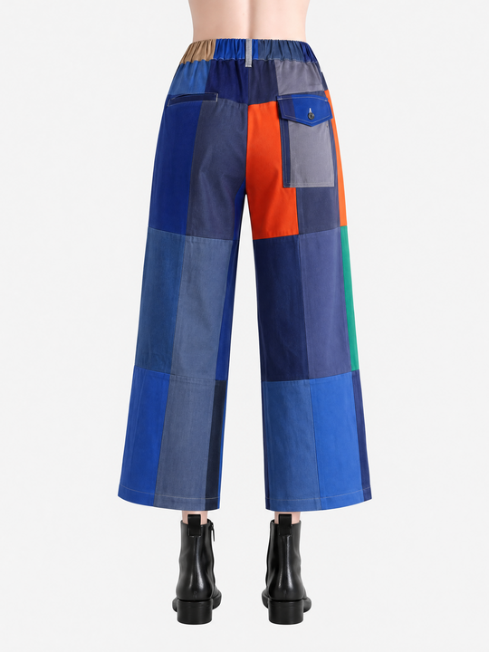 Blue pants worn by a person, showing the pants' fit.