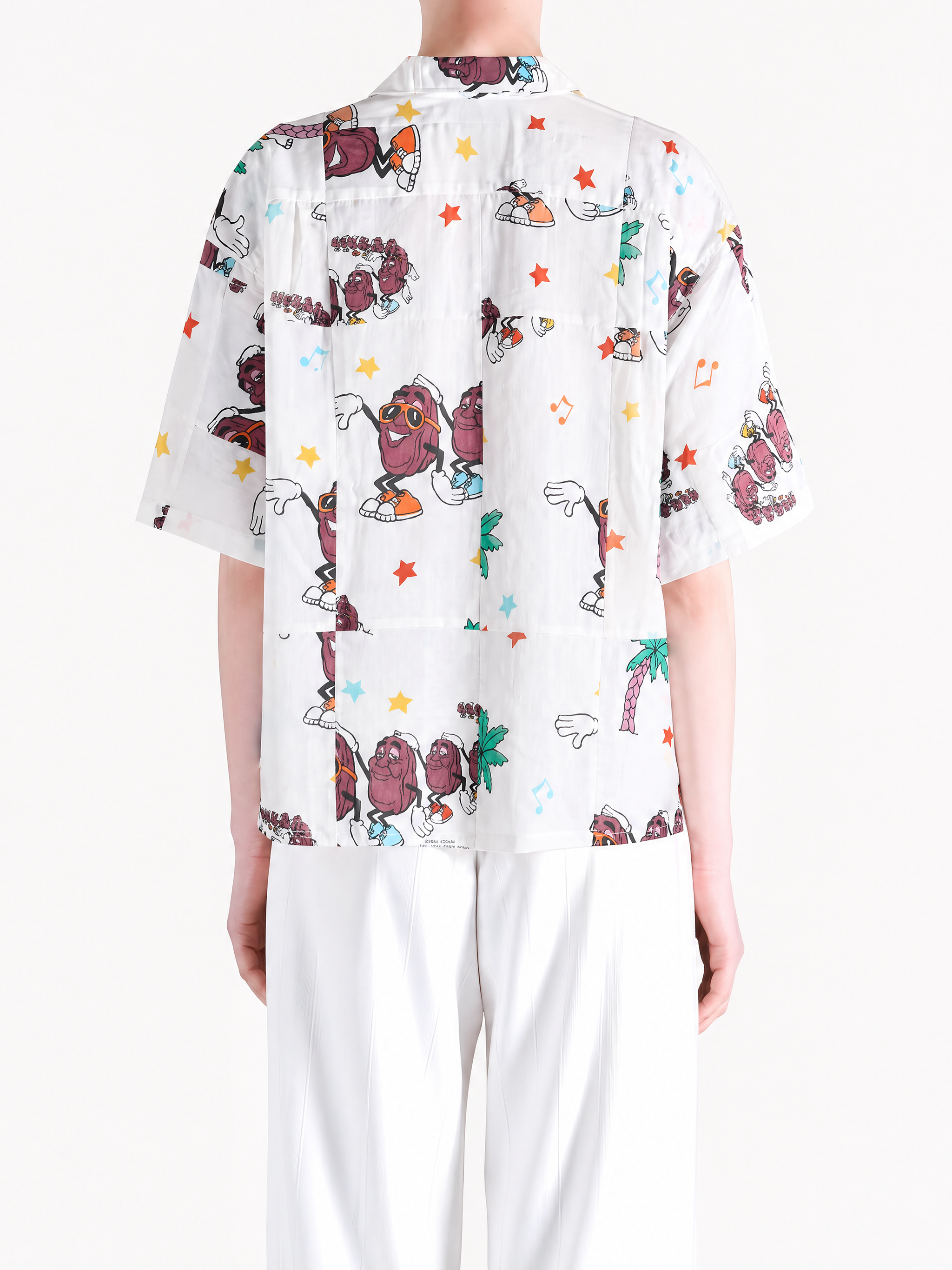 white shirt worn by a person, showing the shirt fit