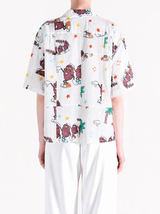 white shirt worn by a person, showing the shirt fit