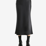 Black skirt worn by a person, showing the skirt's fit