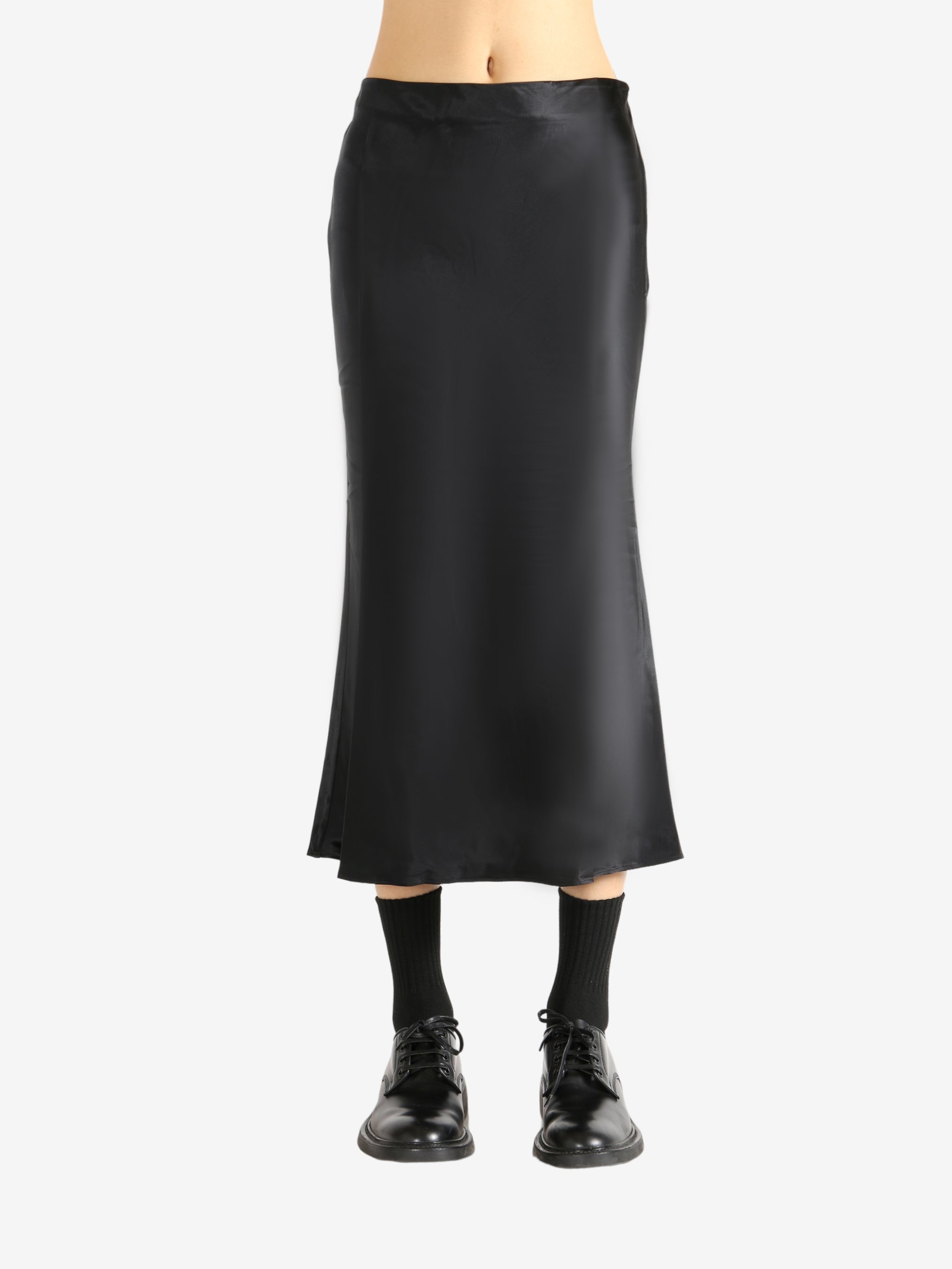 Black skirt worn by a person, showing the skirt's fit