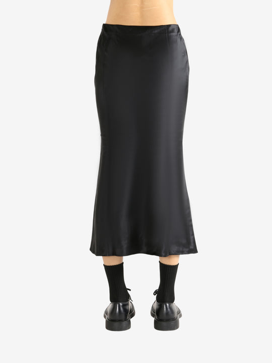 Black skirt worn by a person, showing the skirt's fit
