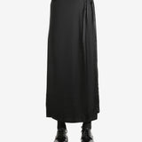 Black skirt worn by a person, showing the skirt's fit