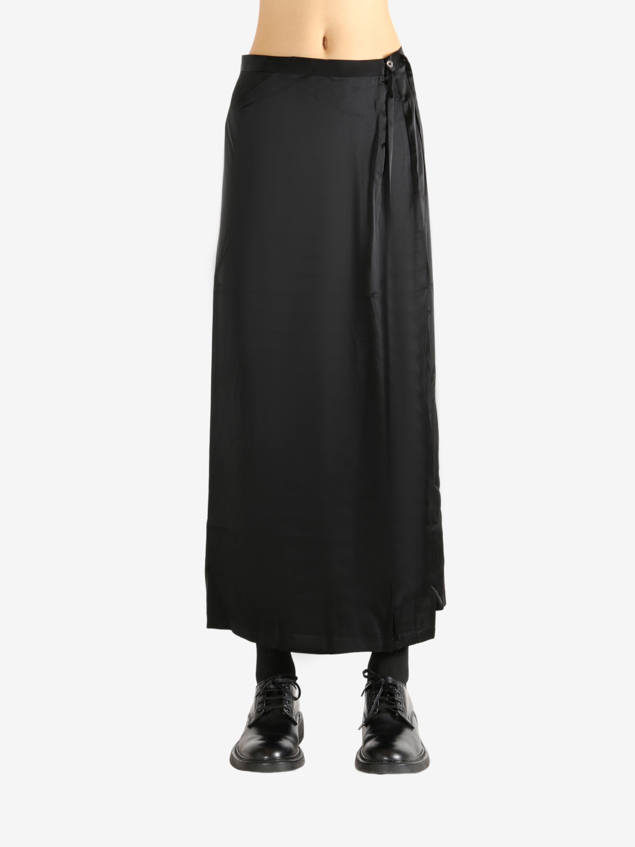 Black skirt worn by a person, showing the skirt's fit