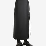 Black skirt worn by a person, showing the skirt's fit