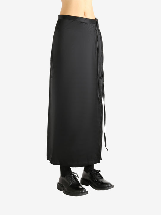 Black skirt worn by a person, showing the skirt's fit