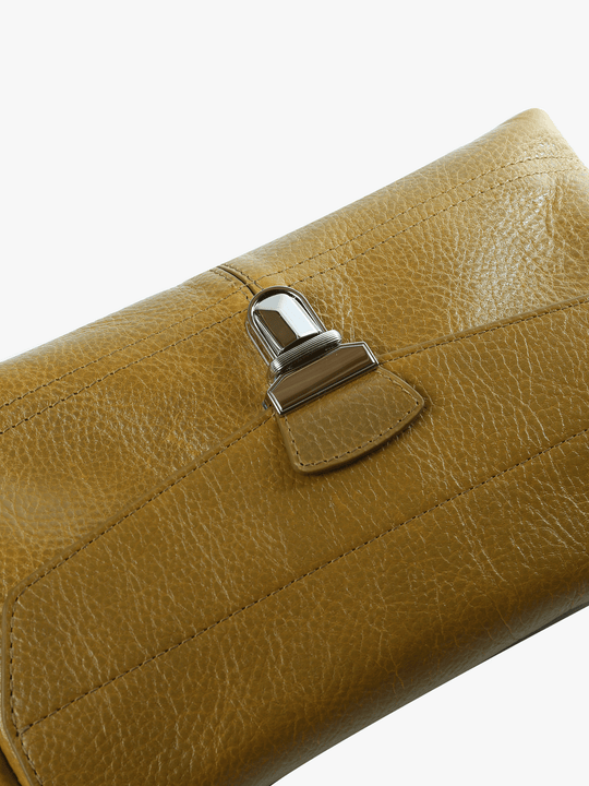 Close up of brown bags, showing texture of the fabric