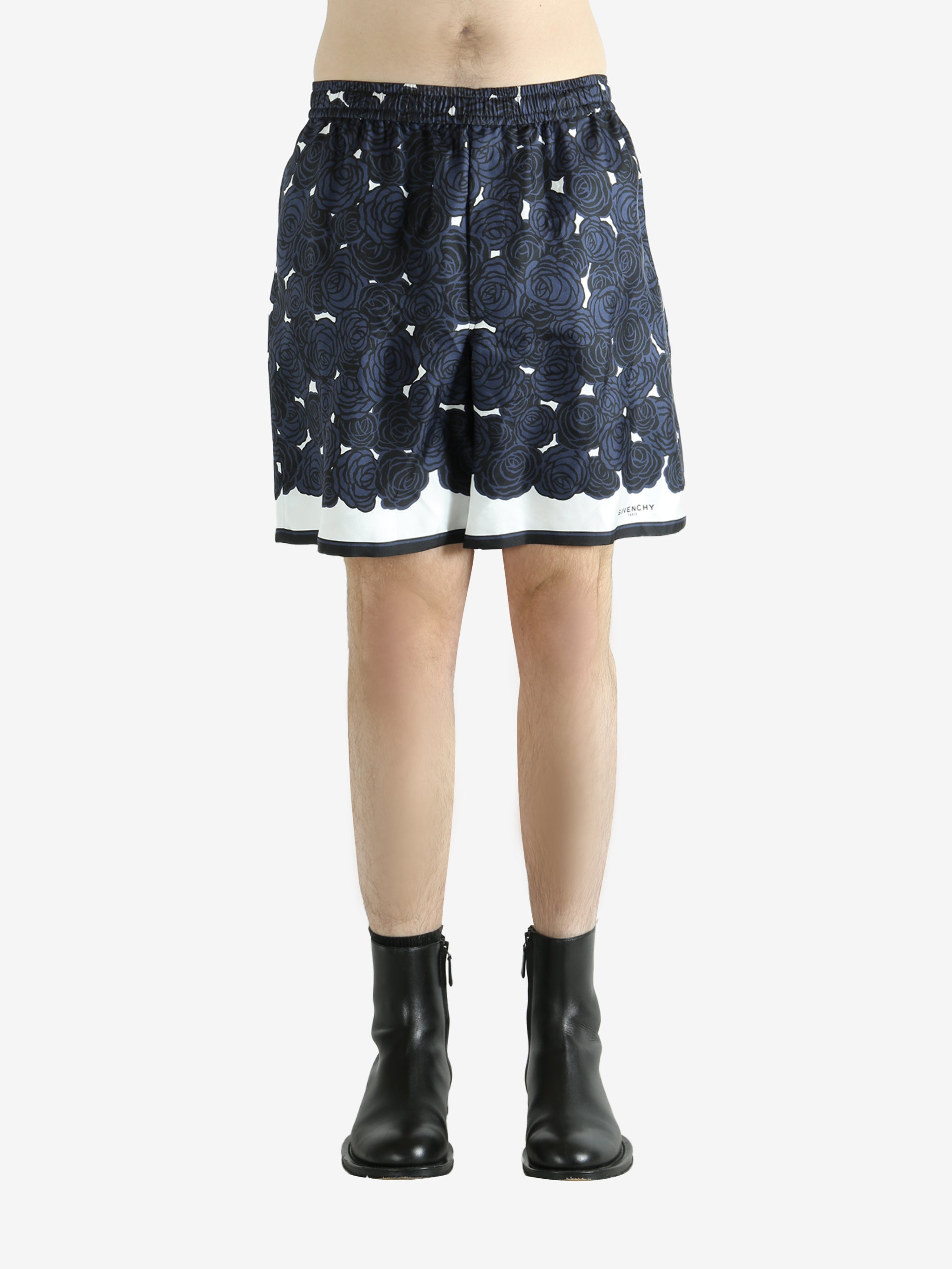 Navy shorts worn by a person, showing the shorts fit