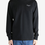 Black t-shirt worn by a person, showing the shirt's fit