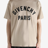 Tan t-shirts worn by a person, showing the shirt's fit