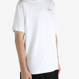 White t-shirt worn by a person, showing the t-shirt's fit