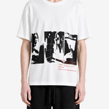 White t-shirt worn by a person, showing the t-shirt fit