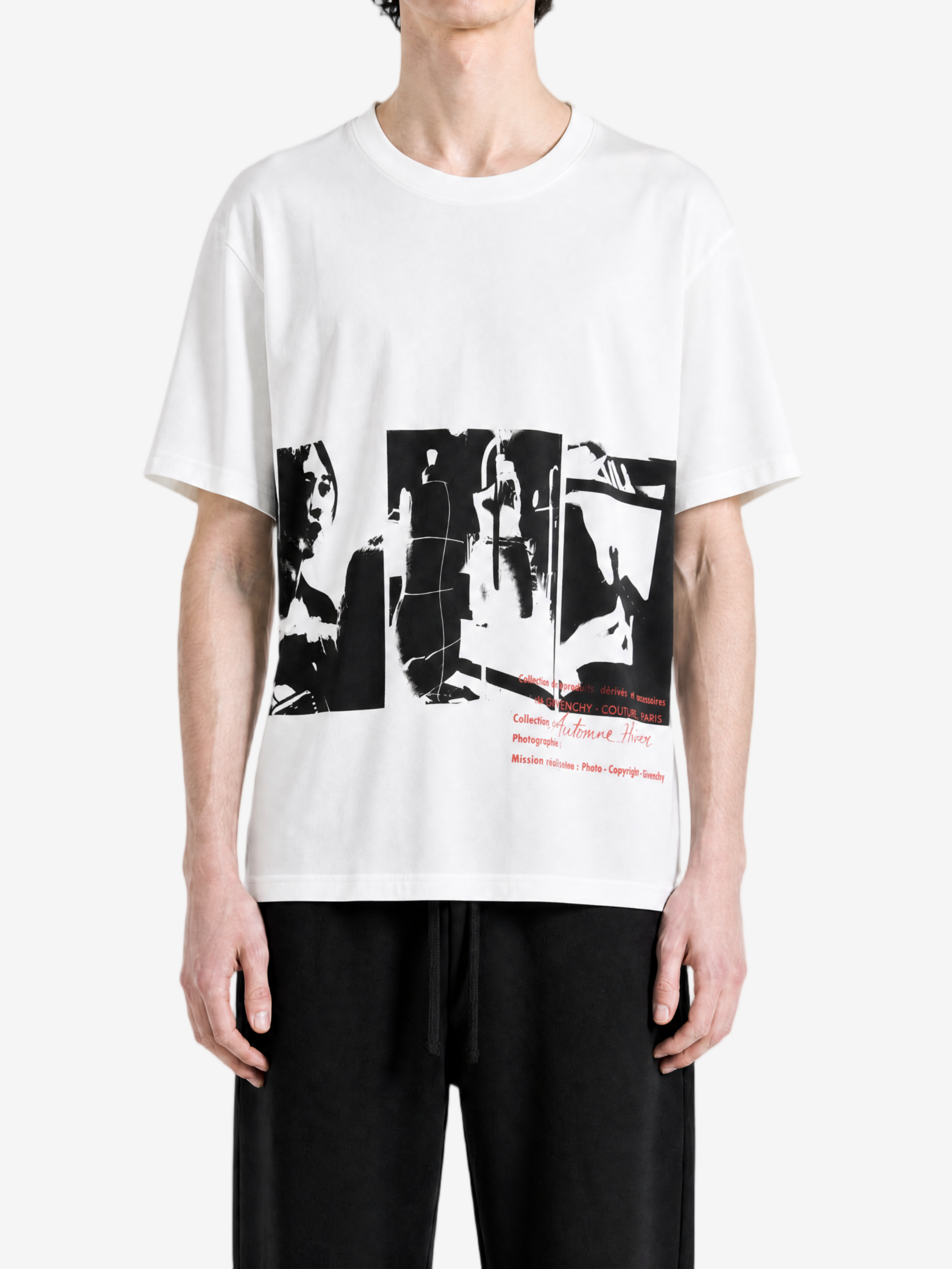 White t-shirt worn by a person, showing the t-shirt fit