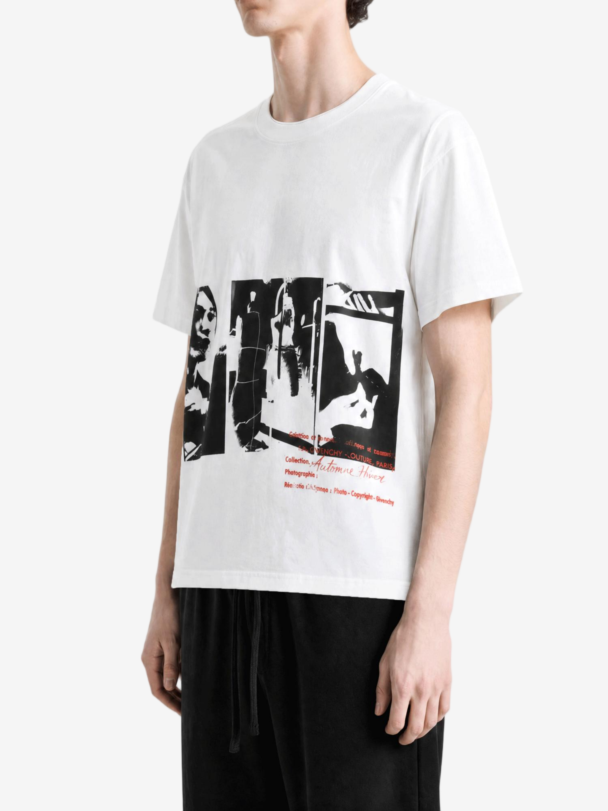 White t-shirt worn by a person, side view