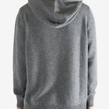 Grey hoodie worn by a person, showing the hoodie fit