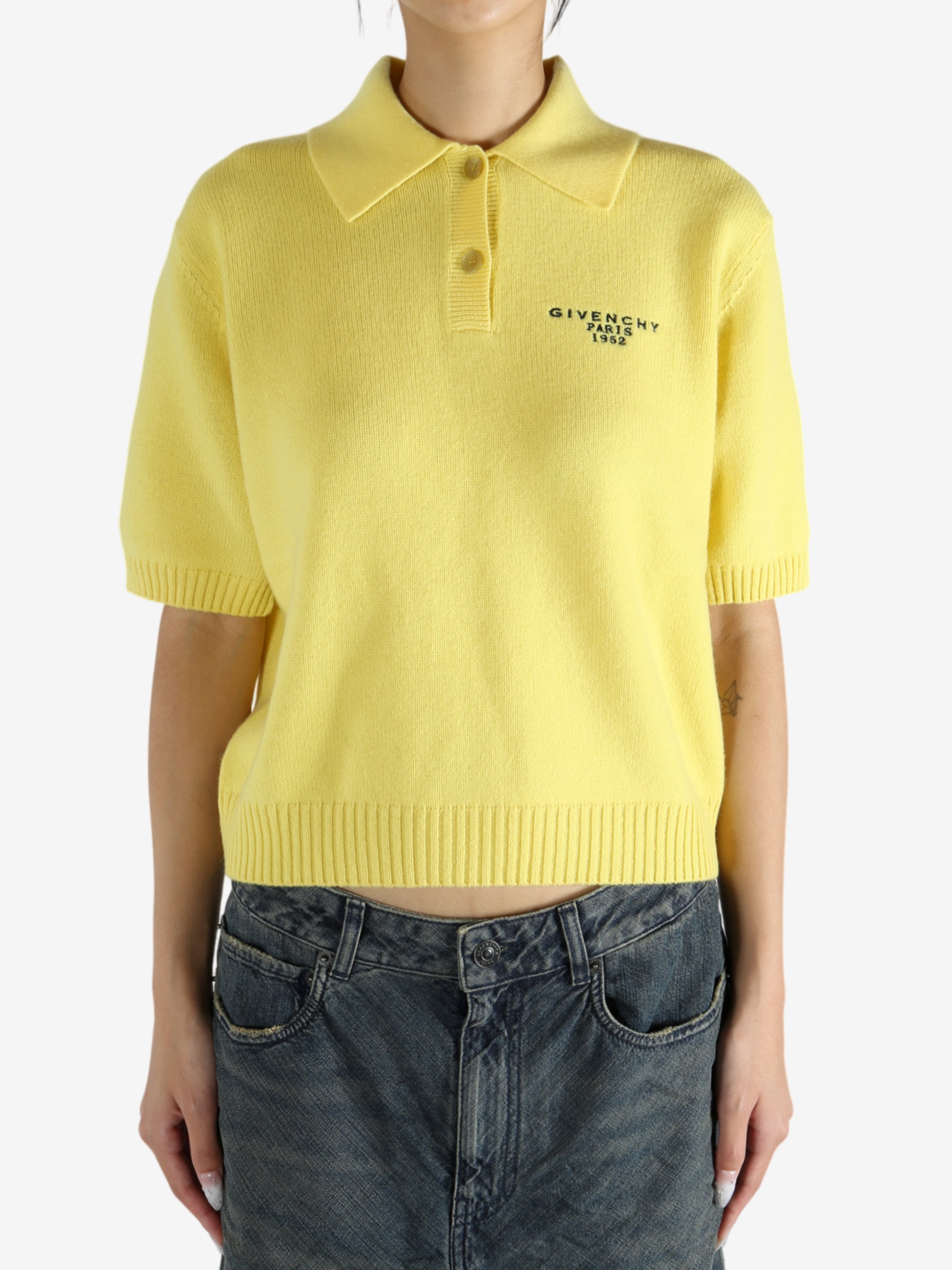 Yellow shirt worn by a person, showing the shirt's fit