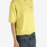 Yellow shirt worn by a person, showing the shirt's fit