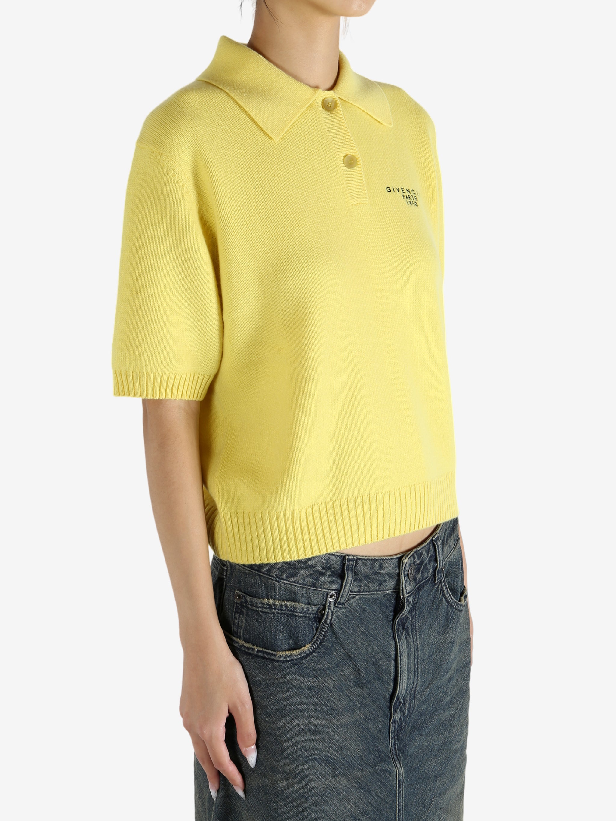 Yellow shirt worn by a person, showing the shirt's fit