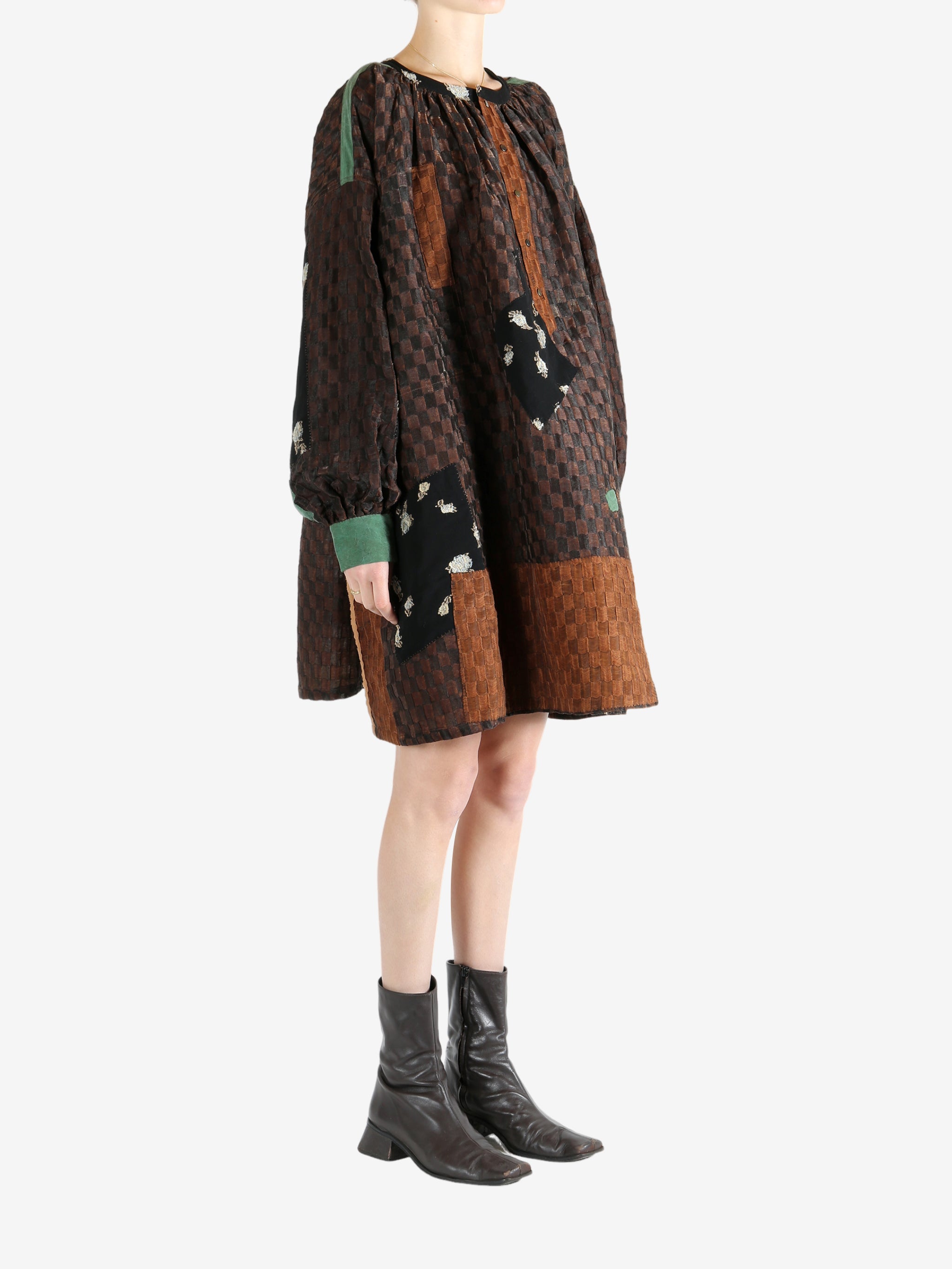 Brown tops worn by a person, showing the top fit