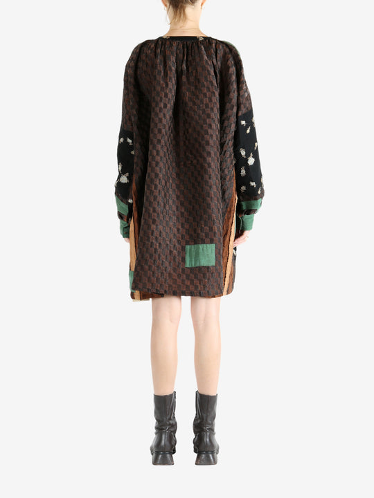 Brown tops worn by a person, showing the top fit