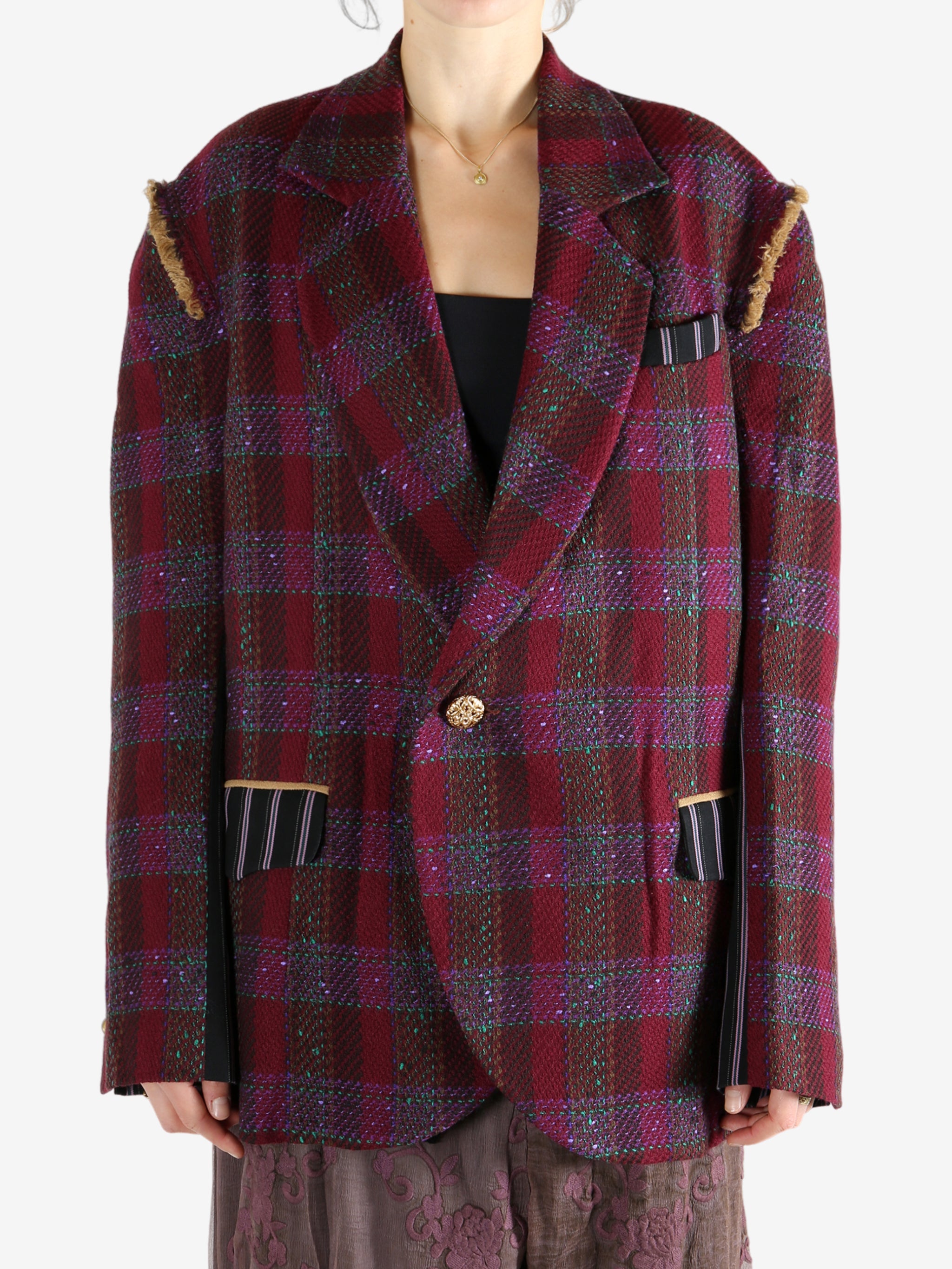 Red jacket worn by a person, showing the jacket's fit