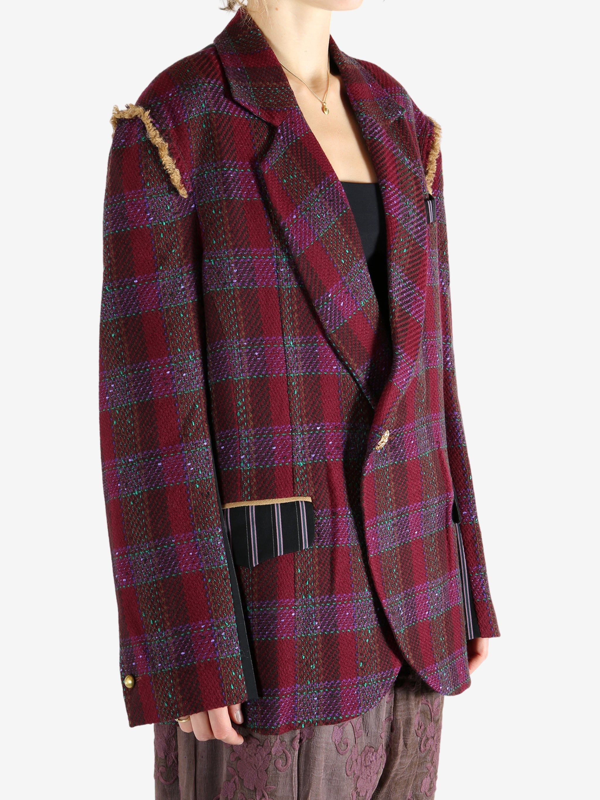 Red jacket worn by a person, showing the jacket's fit