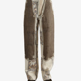 Grey pants, worn by a person, showing the pants's fit